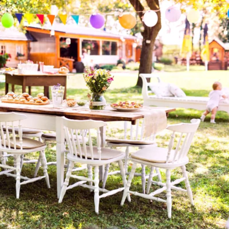 Party setup on pristine grass in pet waste-free backyard