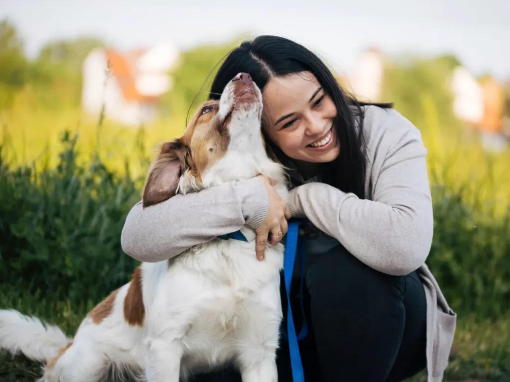 A dog and its owner enjoying the Alaskan outdoors